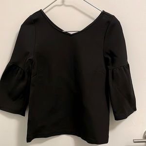 Black V top with bell sleeves